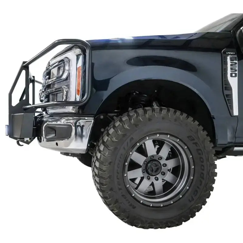 FS23-N5970-1 Fab Fours Winch Mount installed on a truck, showcasing high-quality construction and easy installation for RV, automotive, powersports, off-road, marine, exterior, truck accessories, interior, truck bed, RV parts, Winches & Hitches, AVADA - Best Sellers, Must Haves.