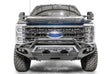 Front view of a vehicle equipped with the FS23-X5952-1 Fab Fours Matrix Front bumper, showcasing aggressive styling and high-quality construction, ideal for RV, automotive, powersports, off-road, marine, exterior, truck accessories, and more. Bumpers, Grilles & Guards, AVADA - Best Sellers, Must Haves