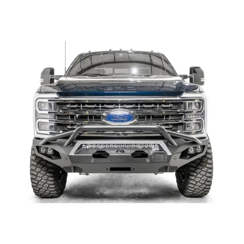Front view of a truck equipped with the FS23-X5952-1 Fab Fours Matrix Front bumper, showcasing its rugged and stylish design, perfect for RV, Automotive, Powersports, off-road or marine applications, truck accessories, interior, truck bed, rv parts, Bumpers, Grilles & Guards, AVADA - Best Sellers, Must Haves