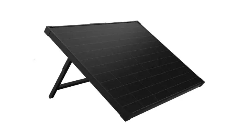 Furrion Llc 100W Portable Rigid Solar Panel Kit (FSPK10MWT-BL) set up for outdoor use, showcasing its durable and efficient design for easy transportation and installation.