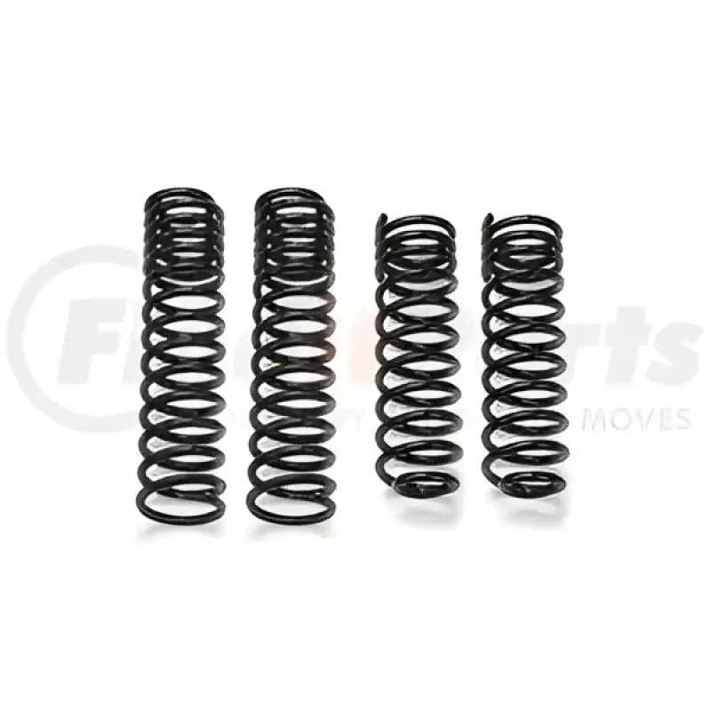 Four black coil springs on FT20342 Fabtech aluminum shock mount bushing for vehicle’s suspension