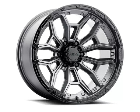 Gray and black Ultra Motorsports wheel on FT20487 Fabtech sway bar extension drvr