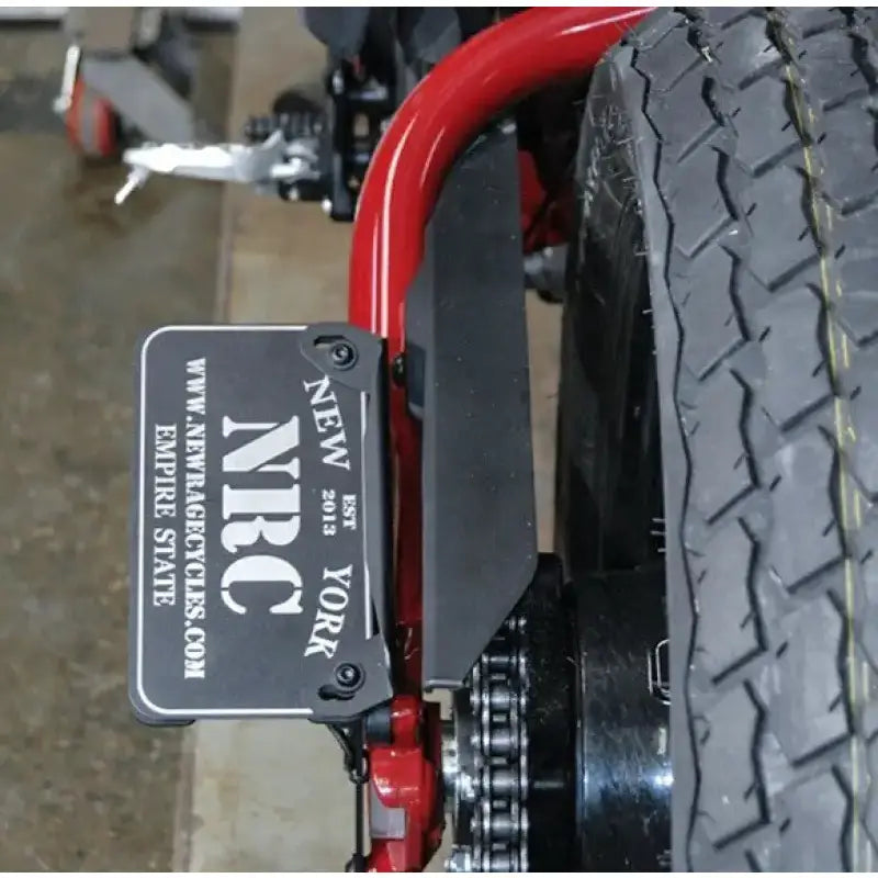 Motorcycle with custom license plate mount license and chain drive on FTR-SIDE Ind