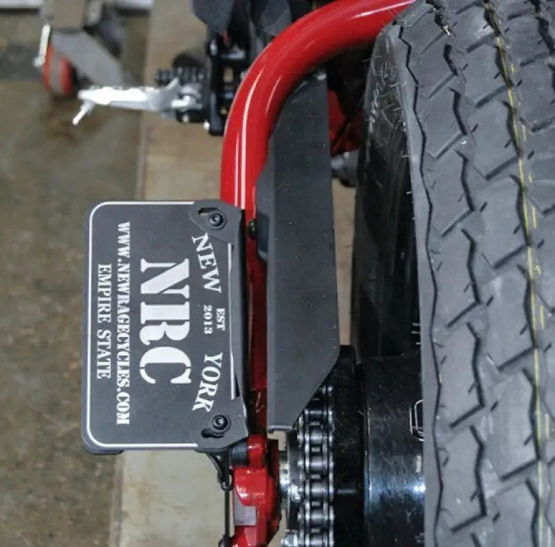 Motorcycle with custom license plate mount license and chain drive on FTR-SIDE Ind