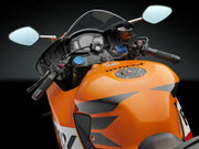 Orange and black Honda motorcycle with gas cap locking black Hon cap locking functionality