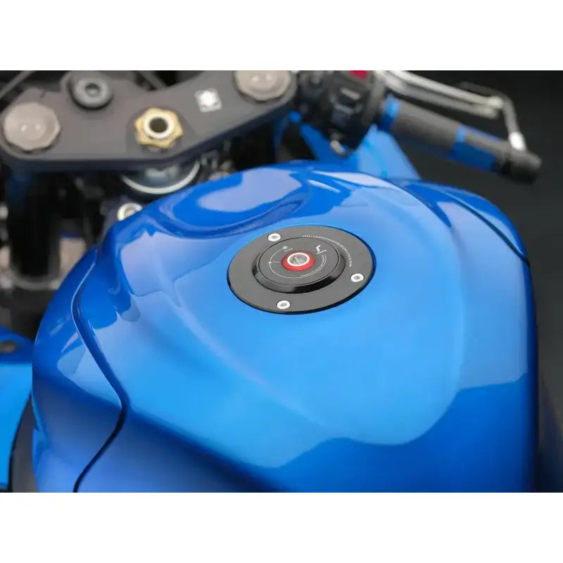 Blue motorcycle fuel tank with gas cap locking for secure cap locking on Suz bike