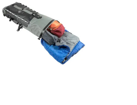 Gray and black giant loop tillamook dry bag with sleeping bag and red sack on bike