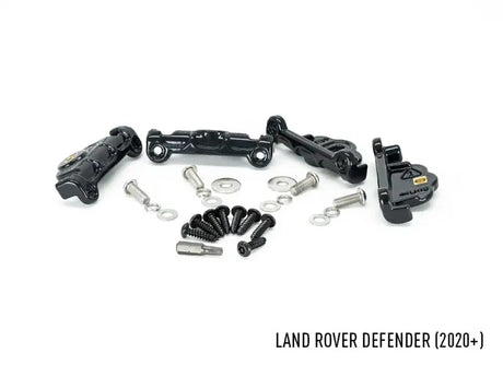 Black metal mounting hardware for Land Rover Defender grill on GM-USDEF750-01K Triplerlight