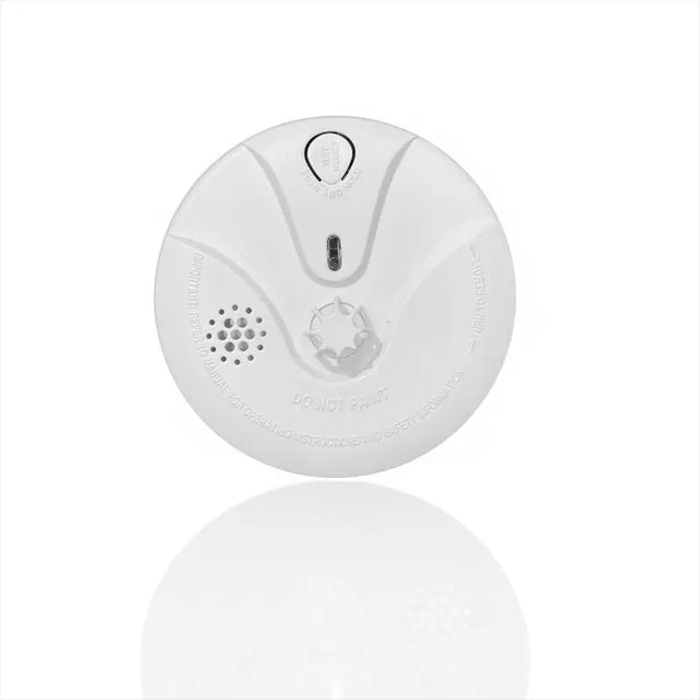 White round smoke detector.