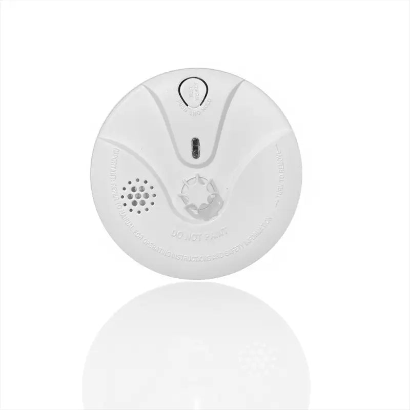 White round smoke detector.