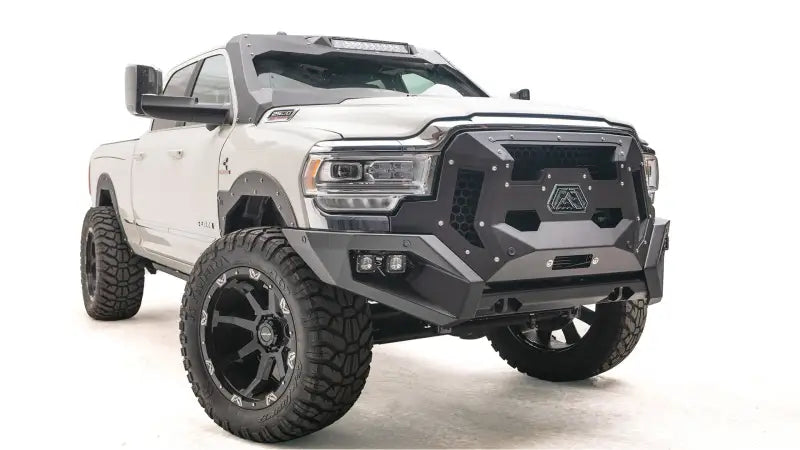 GR2900-1 Fab Fours 16+ Dodge HD Grumper featuring a durable, aggressive front bumper and integrated grille for enhanced off-road performance.