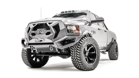 GR2900-1 Fab Fours 16+ Dodge HD Grumper featuring an aggressive front bumper and grille combo on a Dodge HD truck for rugged off-road performance.