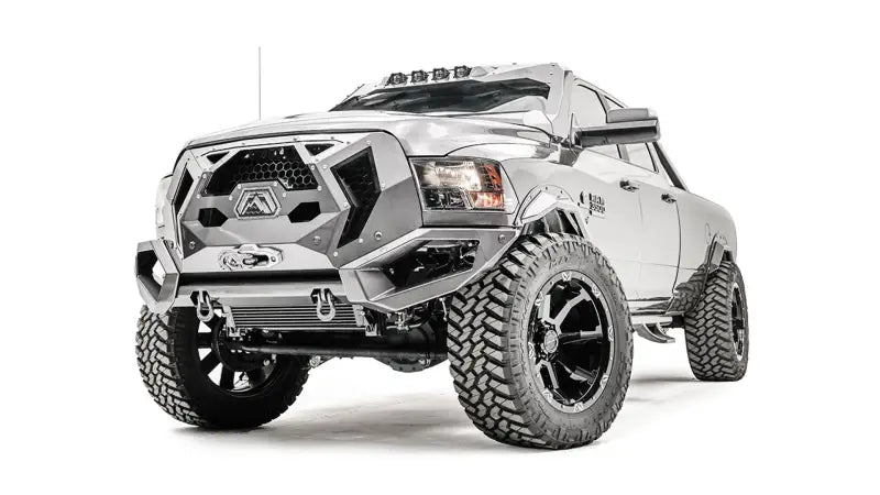 GR2900-1 Fab Fours 16+ Dodge HD Grumper, aggressive front view showcasing integrated grille and durable construction, enhancing the rugged appearance of a lifted Dodge HD truck.