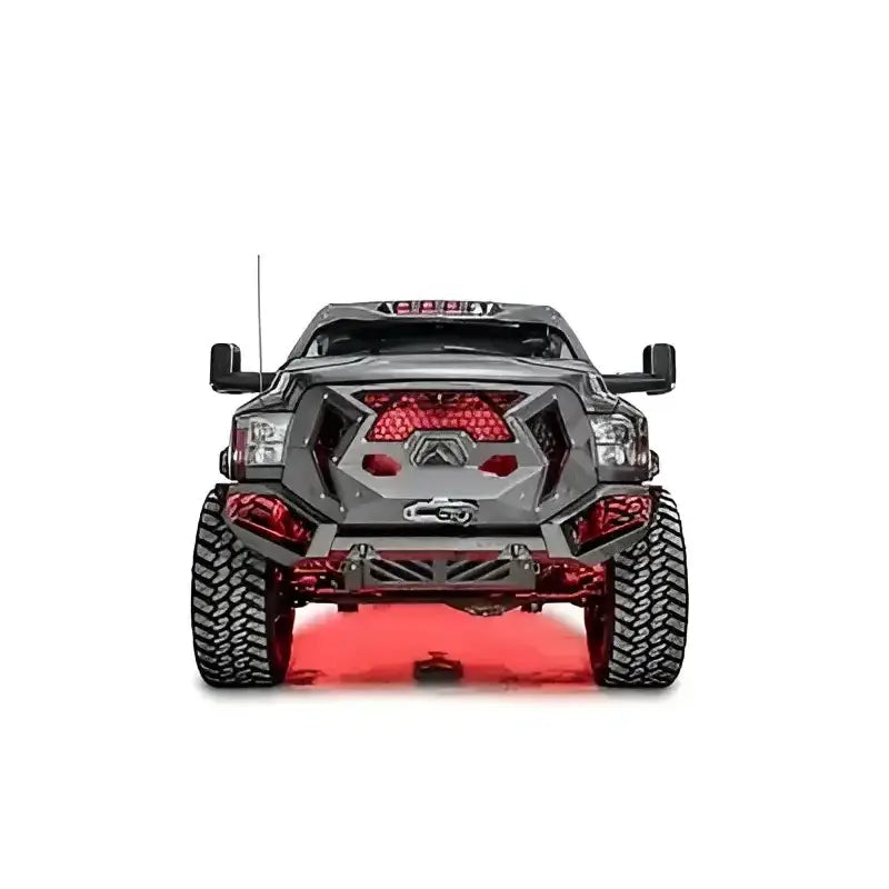 Front view of a Dodge HD truck equipped with the GR2900-1 Fab Fours Grumper, showcasing its integrated grille, aggressive design, and off-road-ready construction.