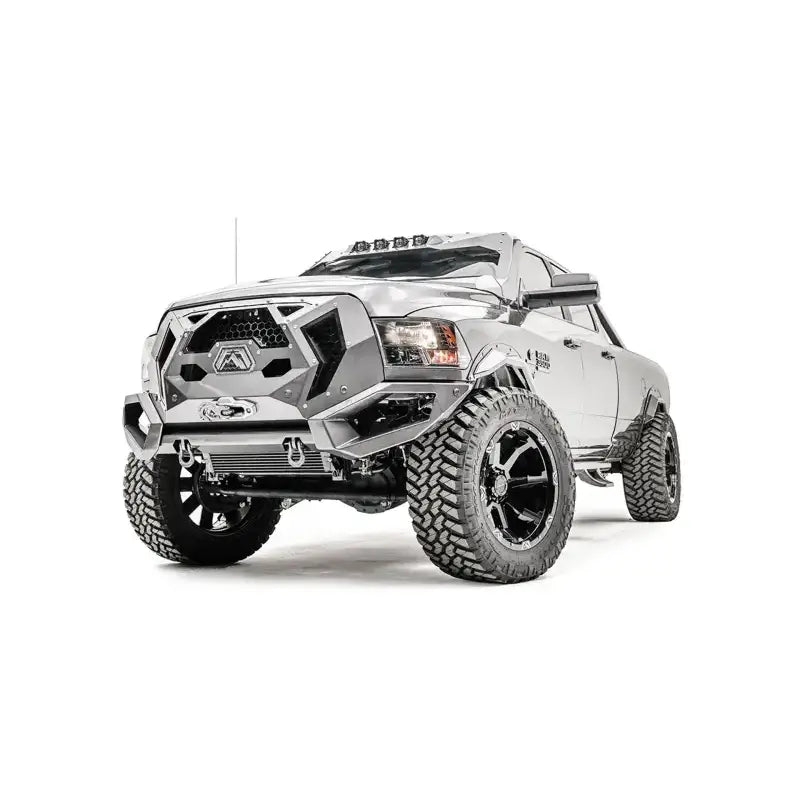 GR2900-1 Fab Fours 16+ Dodge HD Grumper, aggressive front view showcasing integrated grille and durable construction, enhancing the rugged appearance of a lifted Dodge HD truck.