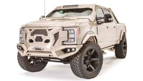 Ford Super Duty equipped with GR4100-1 Fab Fours Grumper, showcasing seamless front bumper and grille integration, enhancing both style and protection.
