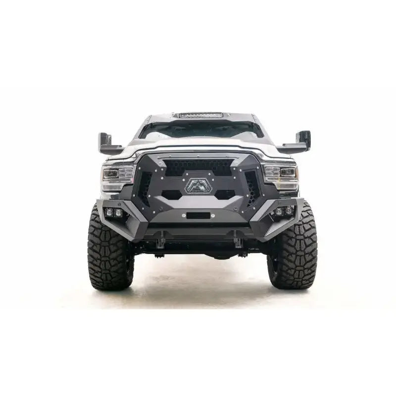 Front view of a Dodge truck featuring the GR4400-1 Fab Fours Grumper, showcasing its rugged, aggressive design, combining grille and bumper for enhanced durability and protection.