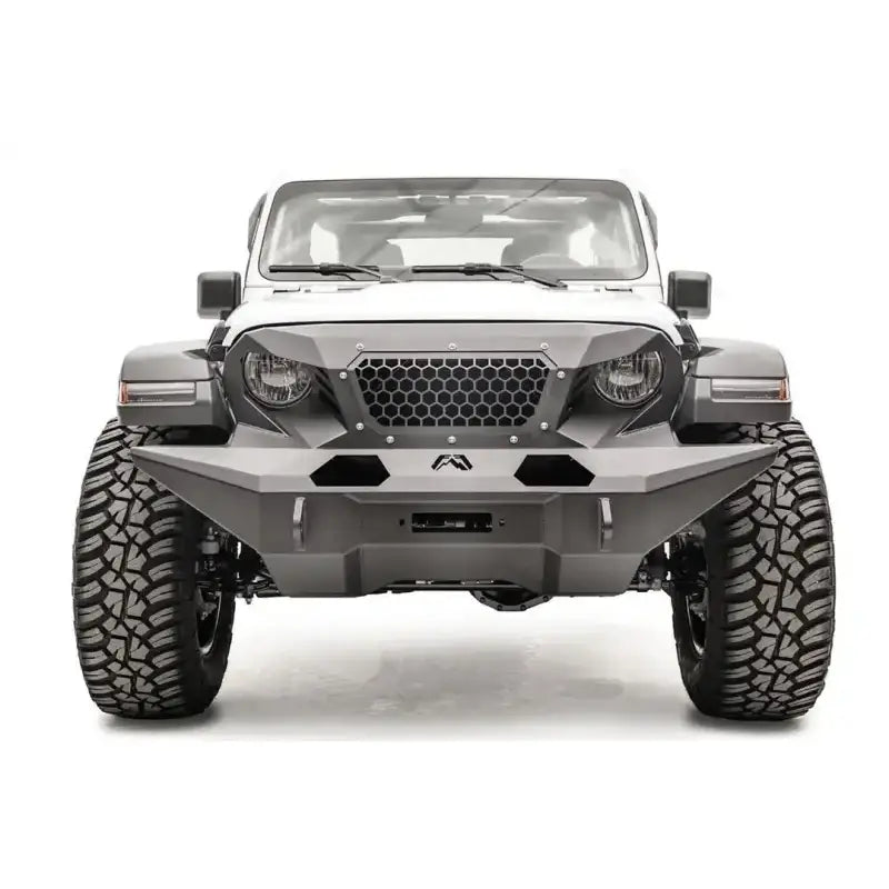 Front view of a white Jeep equipped with GR4610-1 Fab Fours 18 Jp Jl Grumper Full Width, showcasing its aggressive and protective full-width design.
