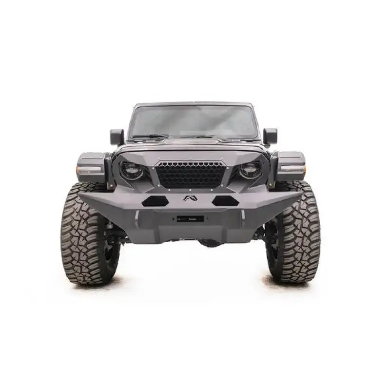 Front view of vehicle equipped with GR4610-1 Fab Fours 18 Jp Jl Grumper Full Width, showcasing enhanced protection and aggressive style.