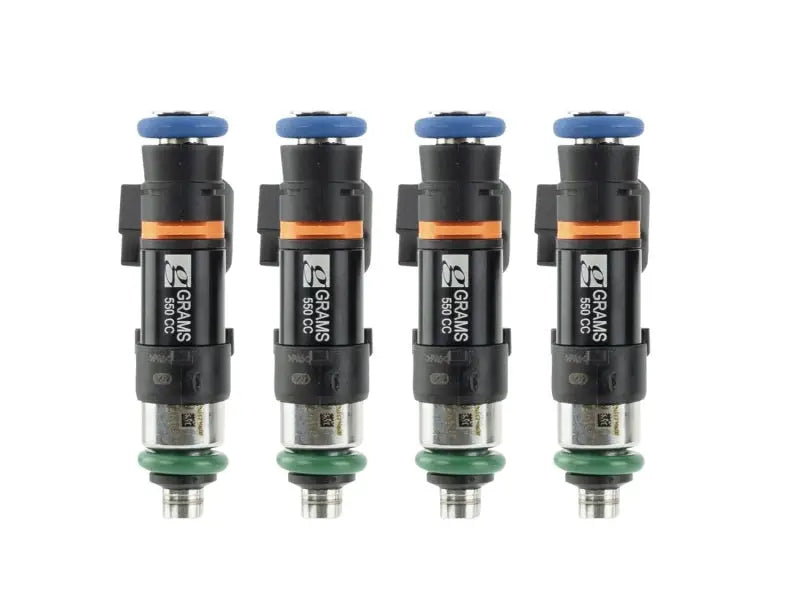 Four black and silver grams performance fuel injectors for Nissan 240sx S13 and S14