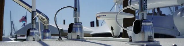 Shiny metallic taco metals electric mount with masthead anchor on boat deck