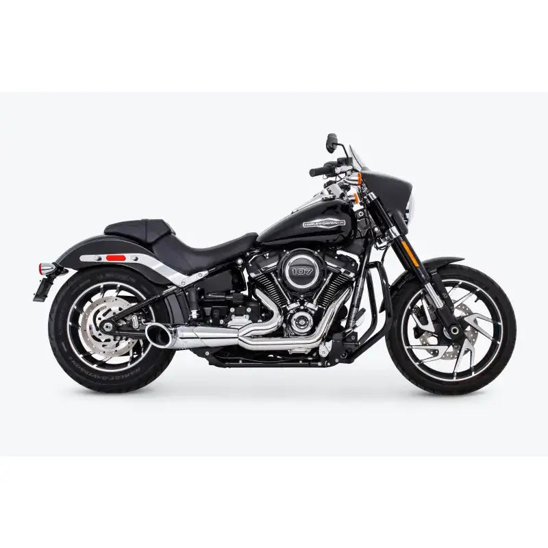 Black Harley-Davidson motorcycle with chrome exhaust and small fairing, perfect for turnout exhaust upgrades