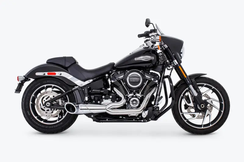Black Harley-Davidson motorcycle with chrome exhaust and small fairing, perfect for turnout exhaust upgrades
