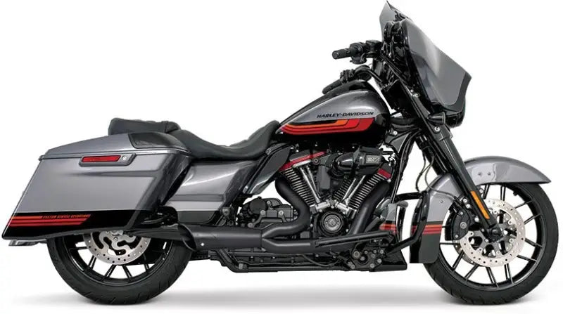 Gray and black Harley-Davidson FLH FLT touring bike with shorty exhaust and pinstripes