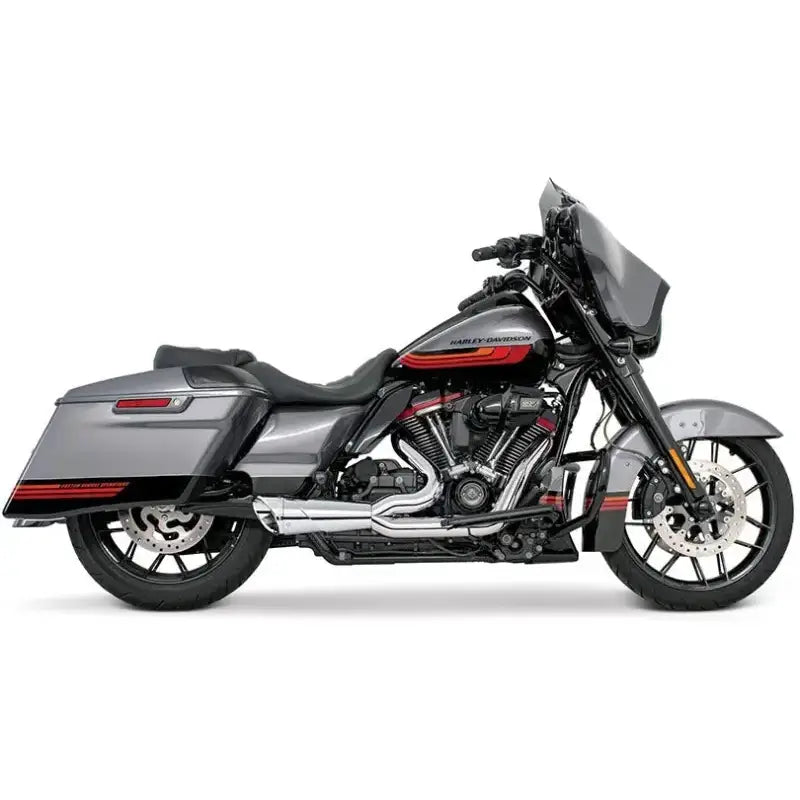 Gray and black Harley-Davidson FLH FLT touring motorcycle with red pinstripes and shorty chrome exhaust