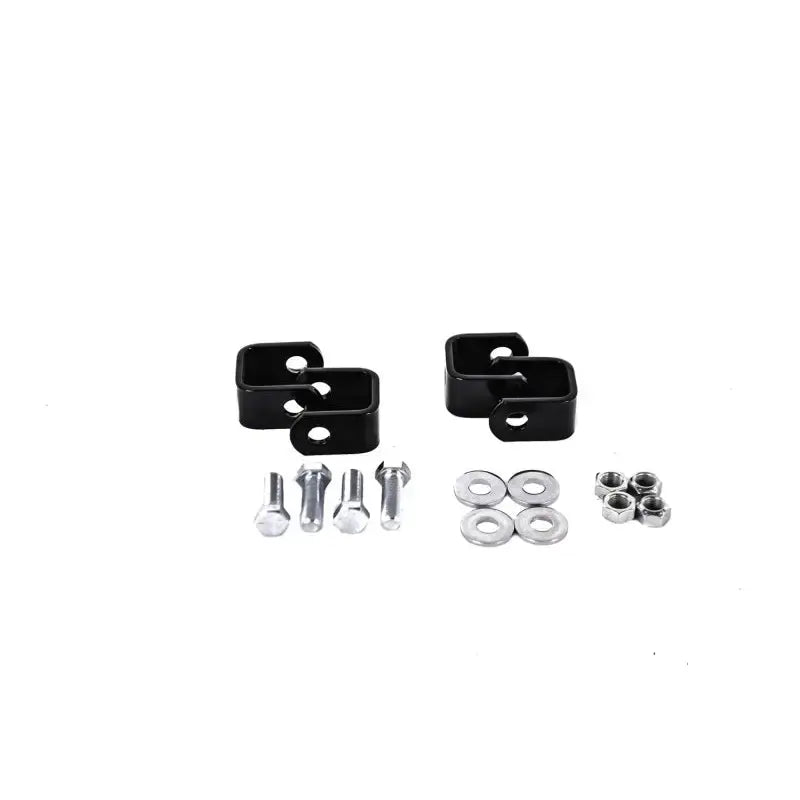 Black metal brackets with hardware for Hellwig End Links Clevis Kit installation