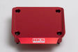 Red, rectangular, metal cover.