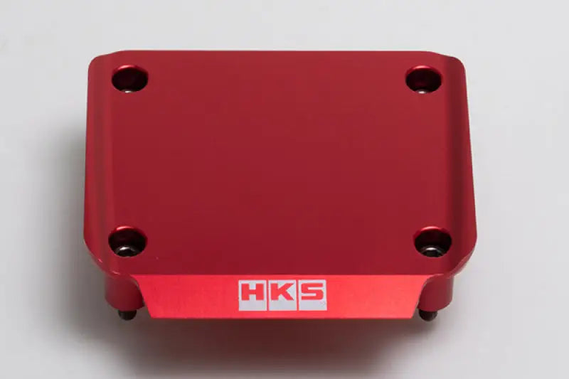 Red, rectangular, metal cover.