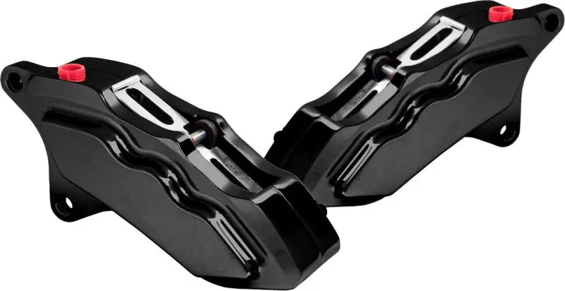 Black hawg halters switch housing with two brake calipers and red bleeder screws