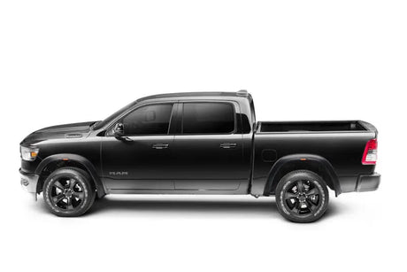 Black Ram pickup truck with Husky Liners RVL Fender Flares 19-23 Ram 1500