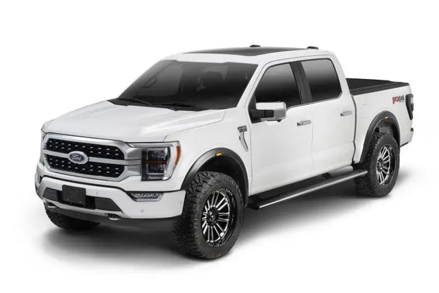 White Ford F-150 pickup truck.