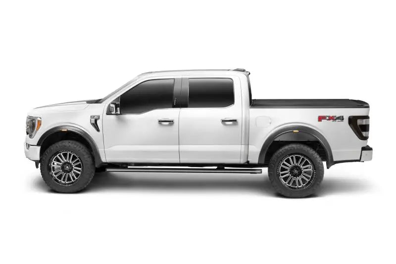 White Ford F-150 pickup truck.