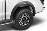 Truck wheel with fender flare.