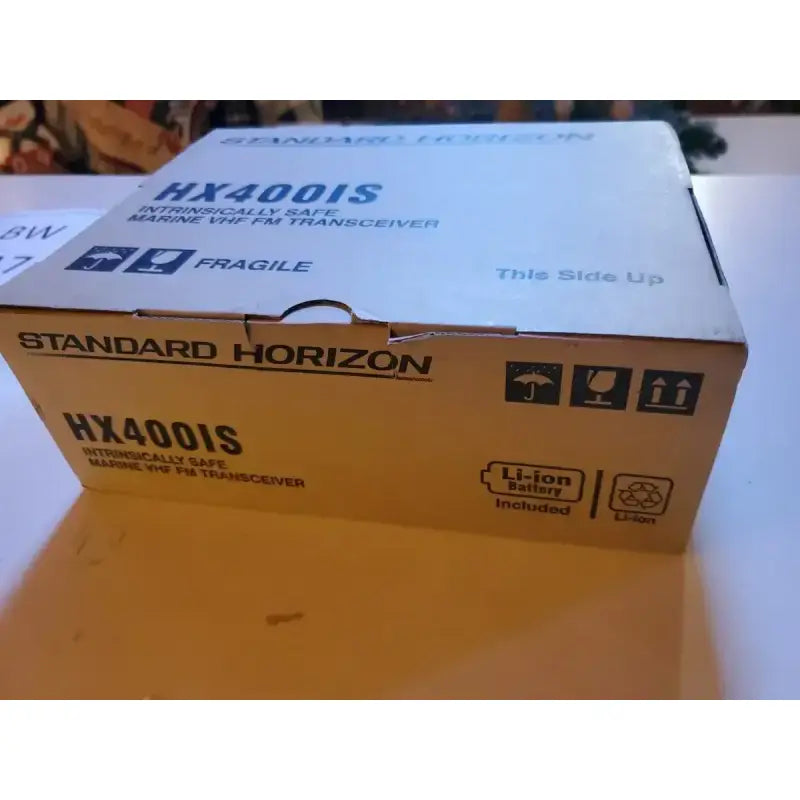 Package of HX400IS Standard VHF Handheld 5Watt Land Mobile Intrinsically Safe Radio by Standard Horizon.