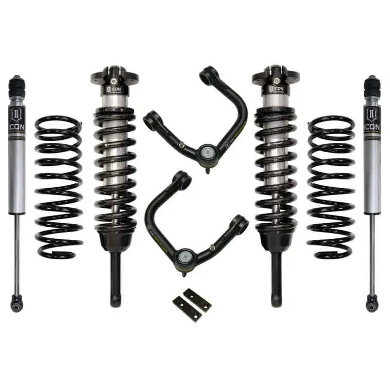 ICON 03-09 Toyota 4Runner/FJ 0-3.5in Stage 2 Suspension System w/Tubular UCA components including shocks, springs, and upper control arms featuring Delta Joint technology.