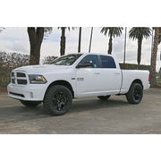 2009-2018 Ram 1500 4WD equipped with ICON Vehicle Dynamics Stage 2 Suspension System featuring 2.5” coilover shocks and Eibach coil springs for improved performance and ride quality.