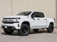 ICON 2019+ GM 1500 1.5-3.5in Stage 2 Suspension System with Tubular UCA installed on a white Chevy Silverado.