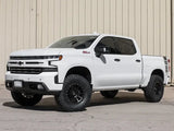 ICON 2019+ GM 1500 1.5-3.5in Stage 2 Suspension System with Tubular UCA installed on a white Chevy Silverado.