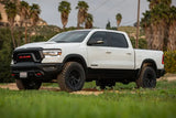 "ICON 2019+ Ram 1500 2/4WD with 0-1.5 inch Stage 1 Suspension System by ICON Vehicle Dynamics, showcased in a rugged off-road setting."