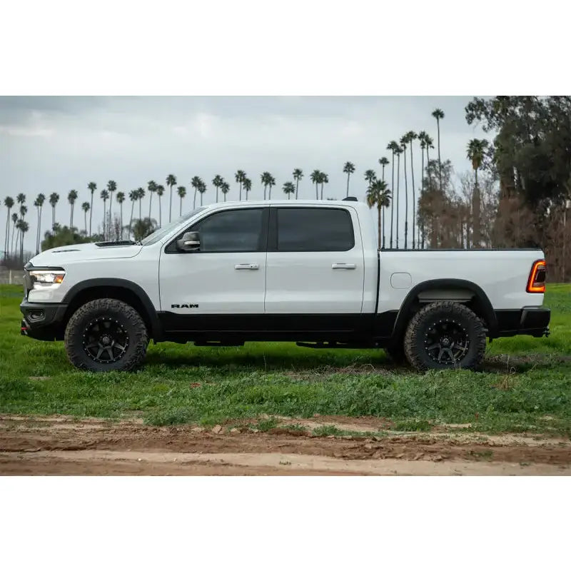 ICON 2019+ Ram 1500 2/4WD with .75-2.5in Stage 1 Suspension System showcasing increased wheel travel and ride quality enhancement.