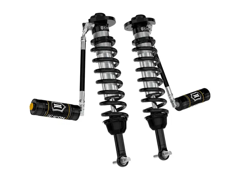 Black and silver coilover shocks with remote reservoirs for Ford F150 4WD 3in lift kit