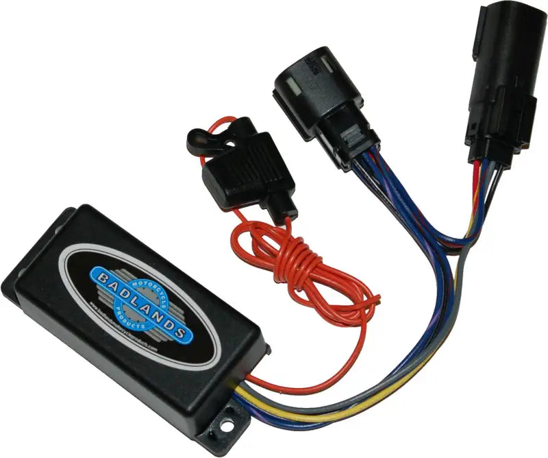 Black electronic module with wire harnesses and fuse holder for bus pnp turn signals