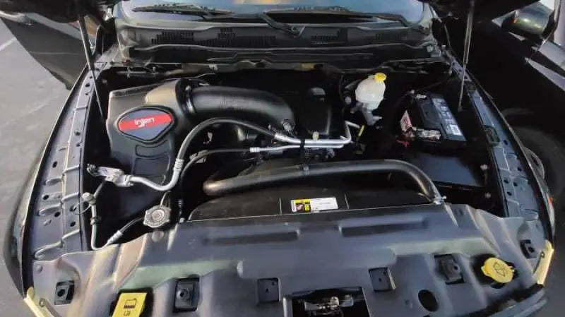 Dodge Ram engine bay with Injen cold air intake for easy installation and performance