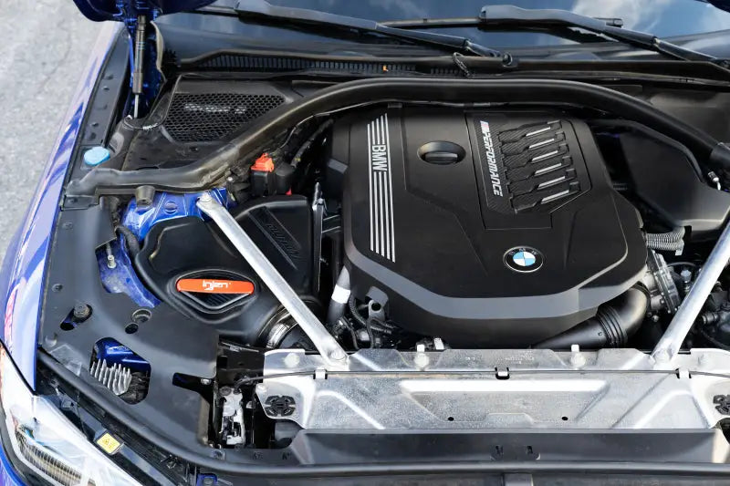 Injen 20-22 BMW M240i/M340i/M440i/xDrive Evolution Roto-Molded Air Intake System W/ SuperNano-Web installed in a BMW engine bay.