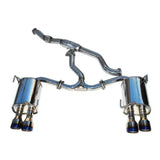 Shiny stainless steel quad tip exhaust on Subaru STI with single layer titanium and blue tips