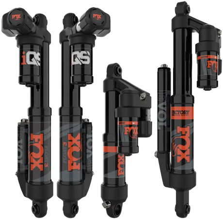 Four Fox Racing Shox mountain bike rear shocks with black bodies and orange branding for Iqs Shock Kit Pol 1.5 Float 3 Iqs Lw